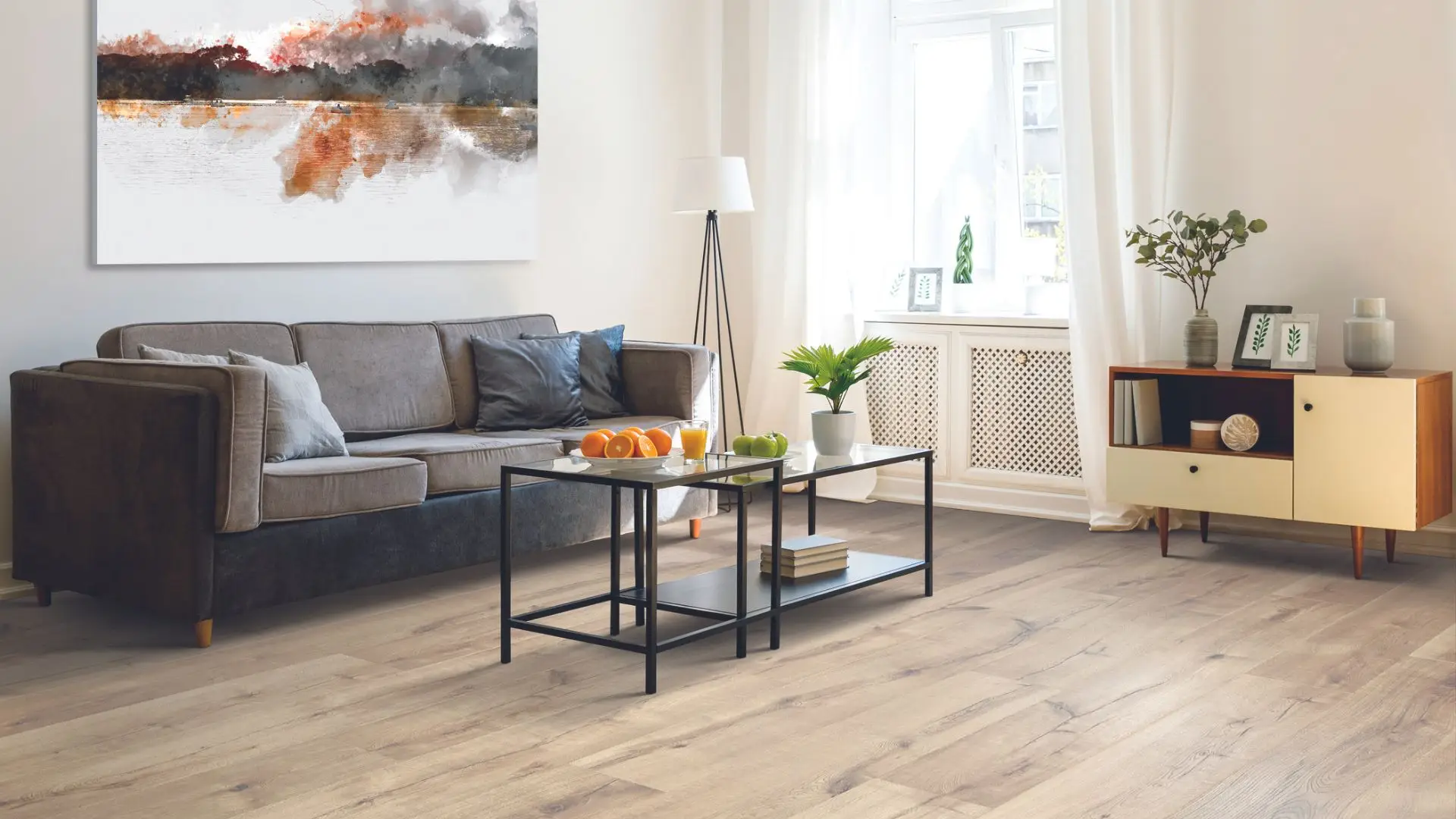 wood flooring with brown sofa and retro furniture